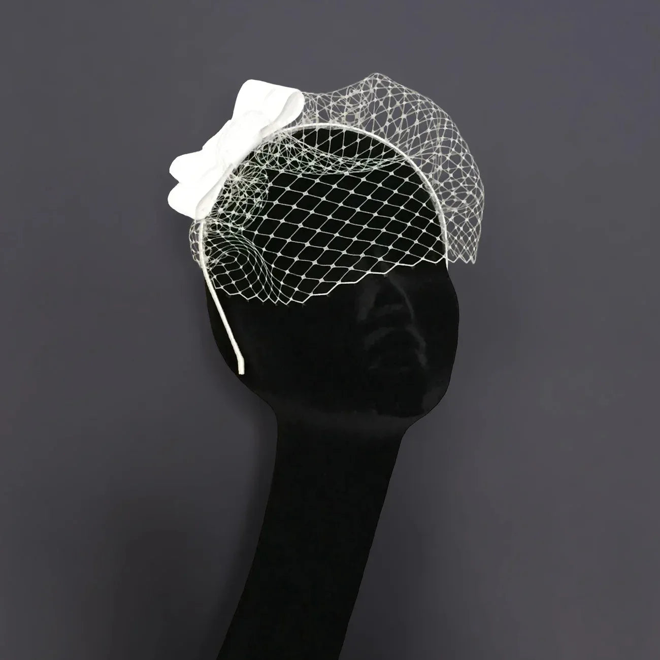 White Luxe Bridal Bow Birdcage Veil Fascinator Hairband | Couture headpiece