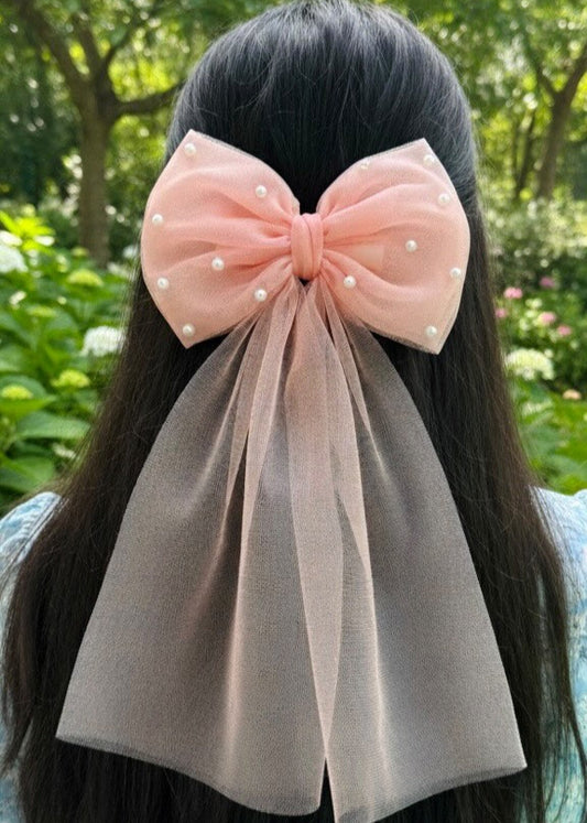 Large pink bow with pearl details