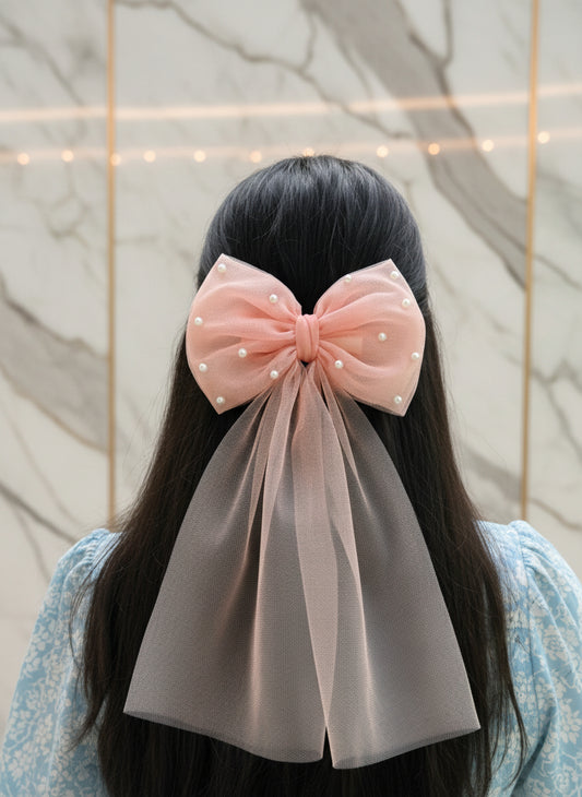 Large pink bow with pearl details