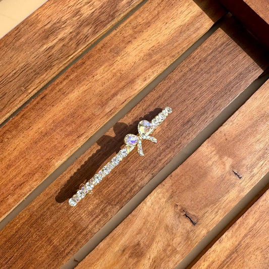 Clear crystals with an opal bow finish Hair Clip