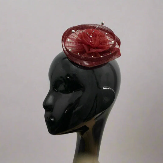 Twisted wine fascinator hat with silver strings