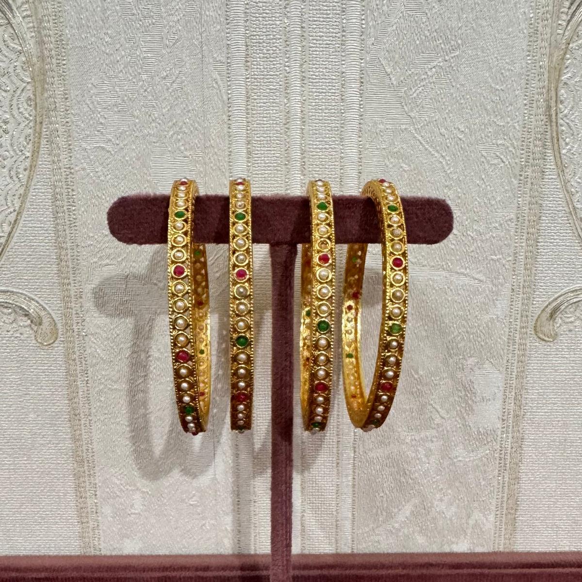 Gold-Plated Bangles with Pearl Detailing