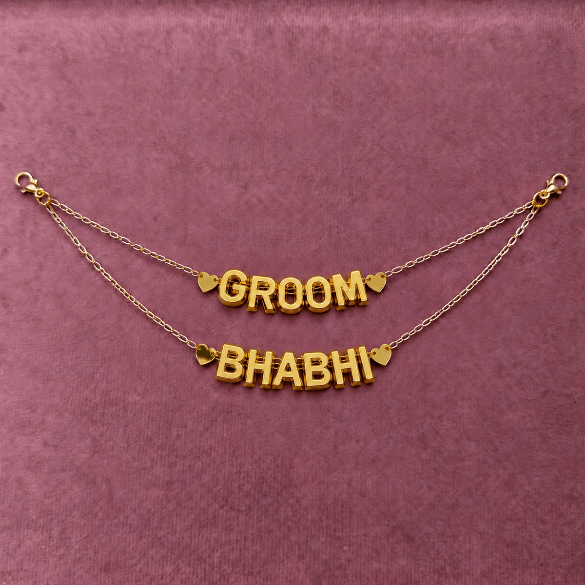 Gold acrylic double drape hair chain with groom and bhabhi bridal styling