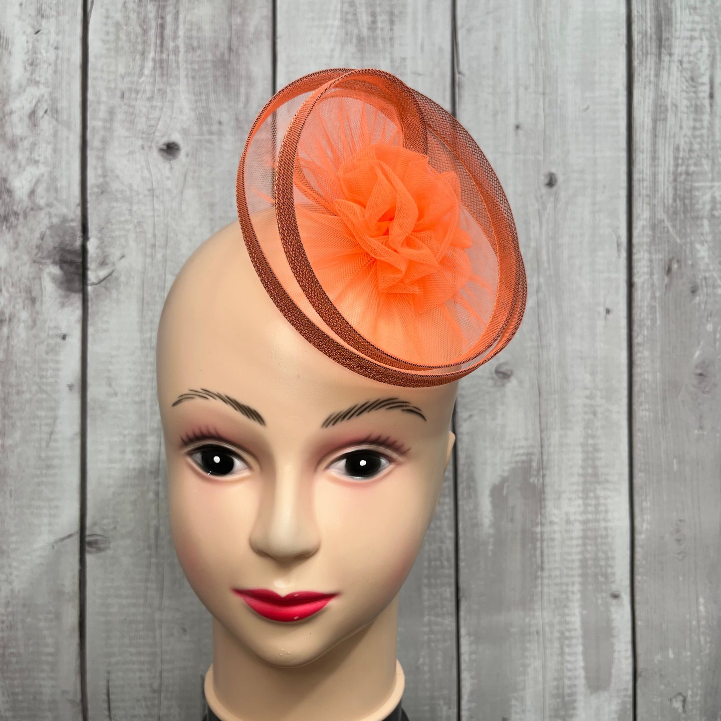 Twisted Orange Flower Fascinator