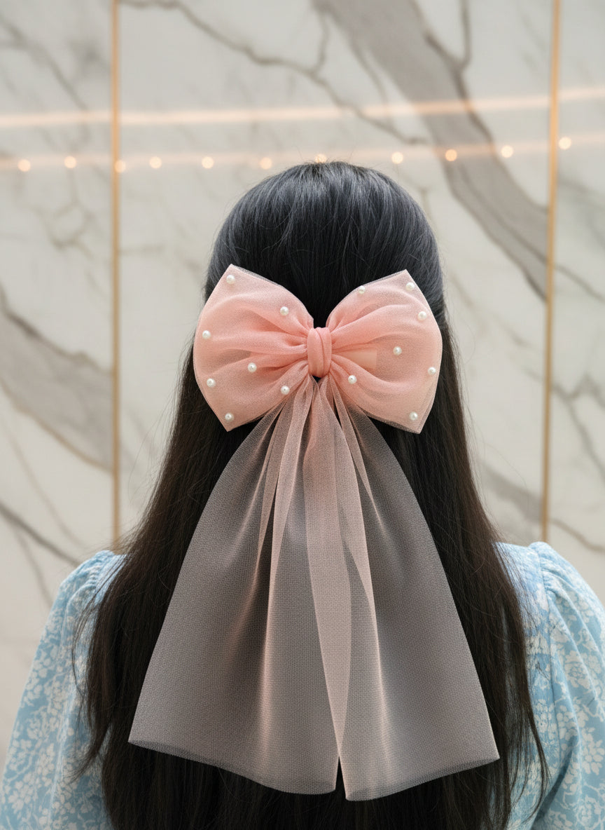 Large pink bow with pearl details