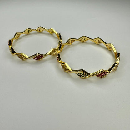Gold-Plated Geometric Bangle with Red & Green Stones – Festive Jewelry