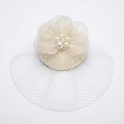 Aurielle Ivory Disc Fascinator with Birdcage Veil