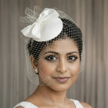 Celeste White Bow Birdcage Veil Disc Fascinator