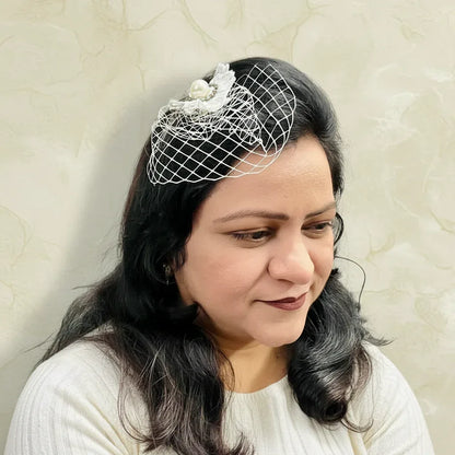 Short white veil fascinator hair clip