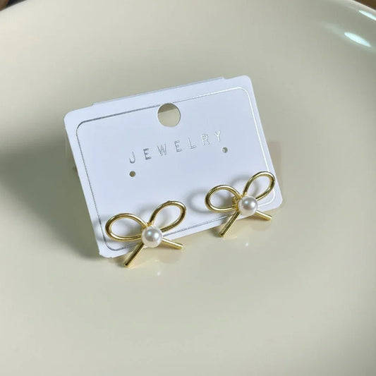 Gold Bow Pearl Stud Earrings