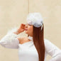 white fascinator
